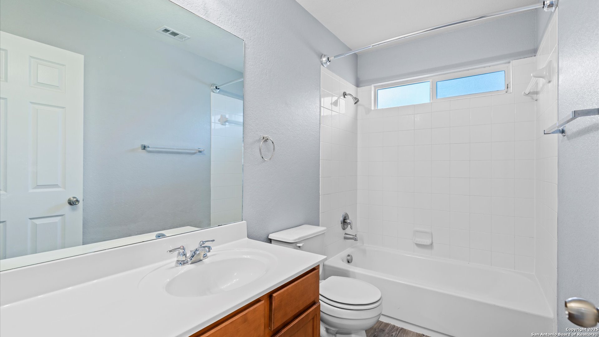 2744 Sterling Way Schertz, TX 78108 - Photo 14 of 22 a bathroom with a sink toilet and shower