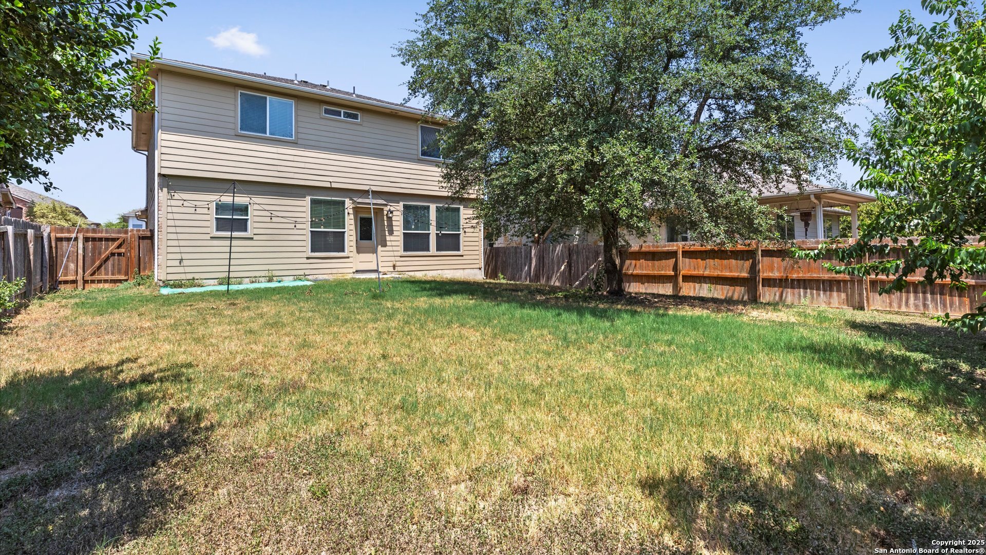 2744 Sterling Way Schertz, TX 78108 - Photo 20 of 22 a view of a house with a yard