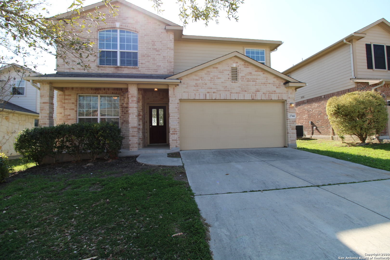 2744 Sterling Way Schertz, TX 78108 - Photo 2 of 22 a front view of a house with garden