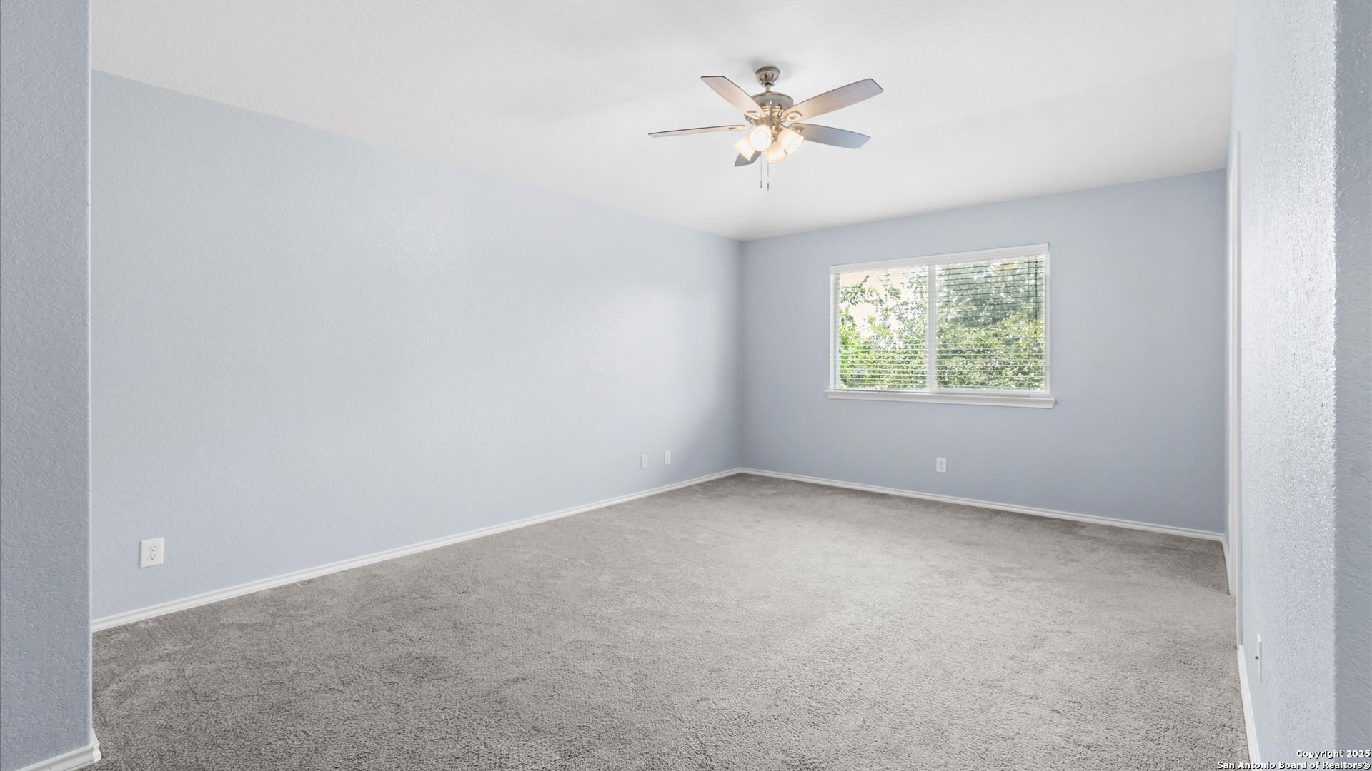 2744 Sterling Way Schertz, TX 78108 - Photo 9 of 22 an empty room with windows