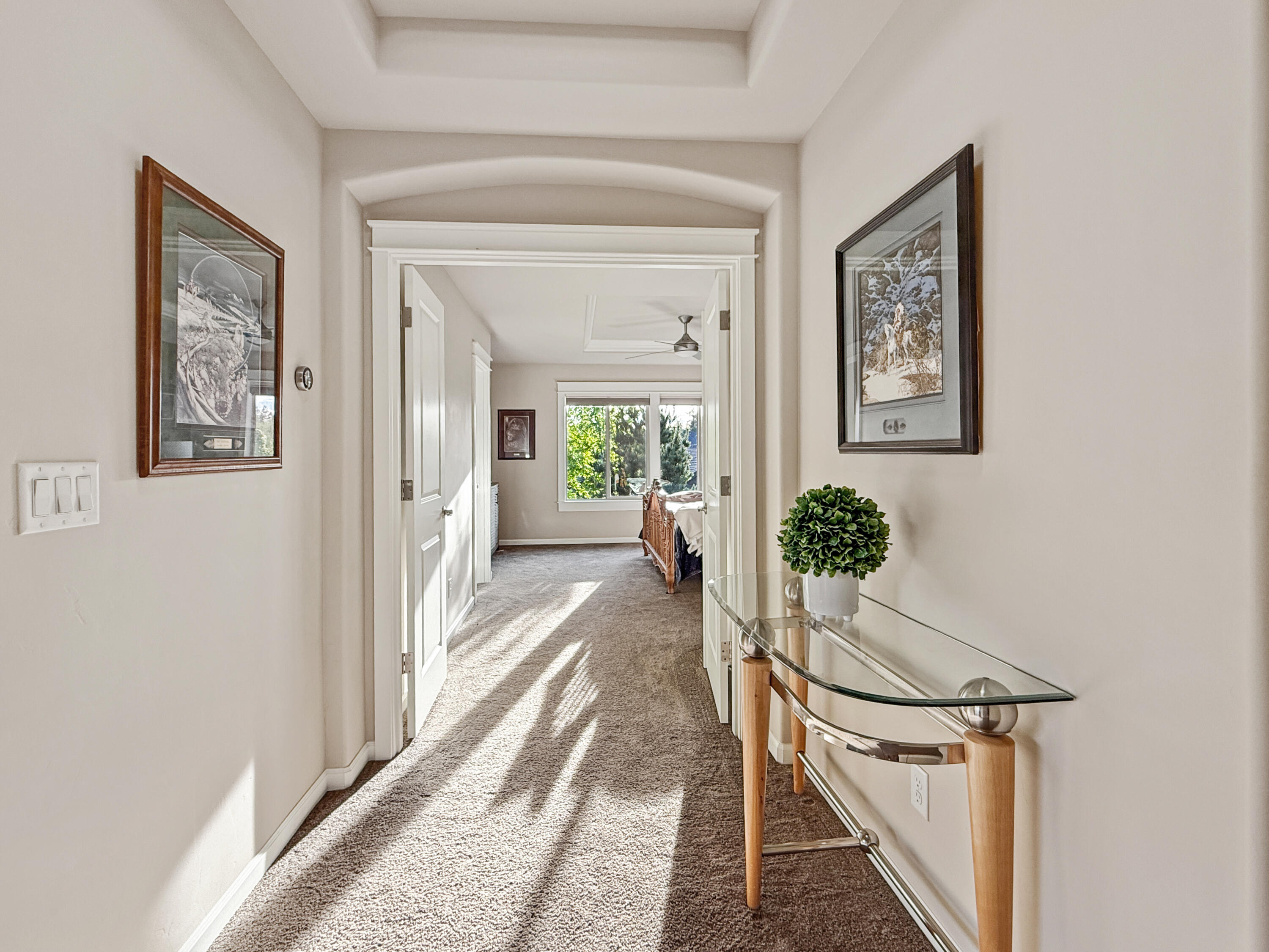 61072 Manhae Loop Bend, OR 97702 - Photo 19 of 63 a view of a hallway and a livingroom with furniture
