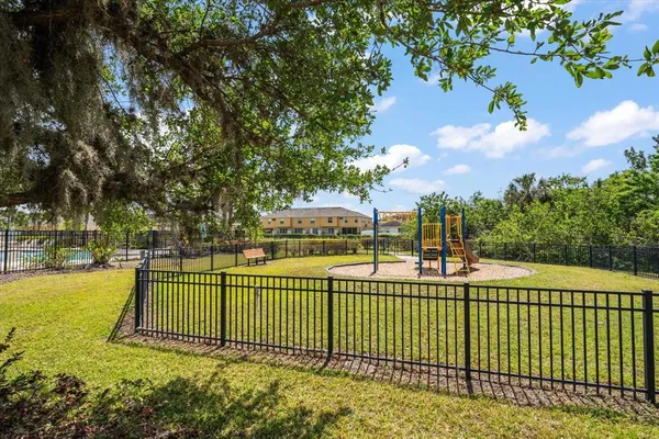 a view of a wrought fences in front of a house
