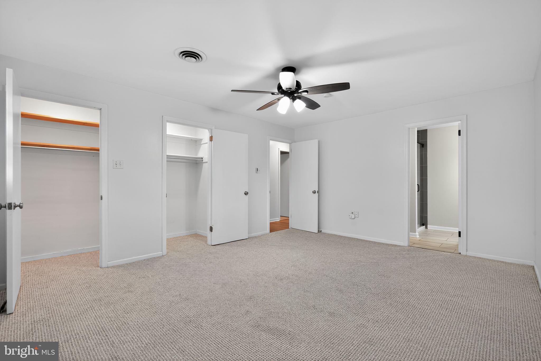 908 Yardley Commons Yardley, PA 19067 - Photo 11 of 28 a view of an empty room with a ceiling fan
