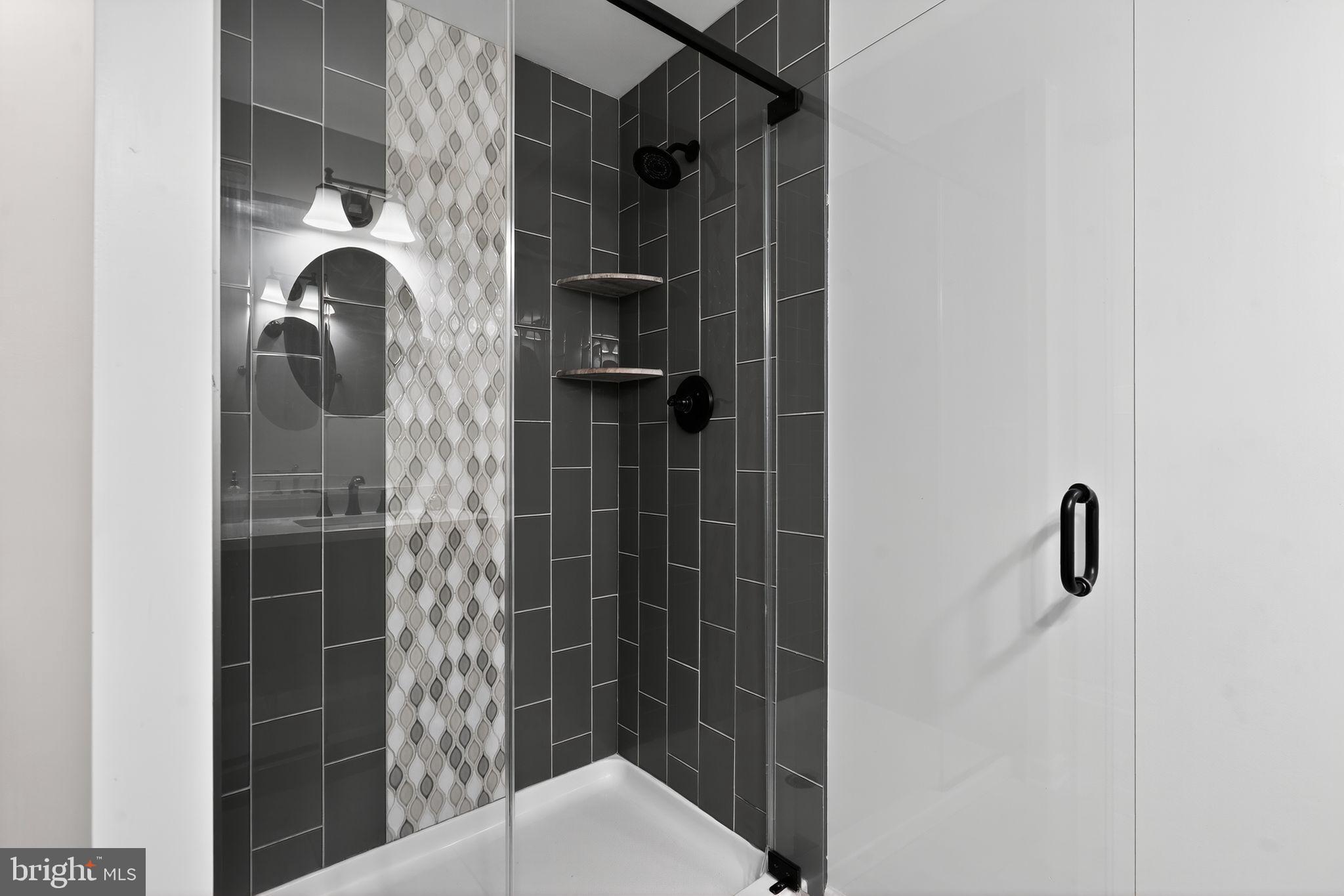 908 Yardley Commons Yardley, PA 19067 - Photo 13 of 28 a bathroom with a shower