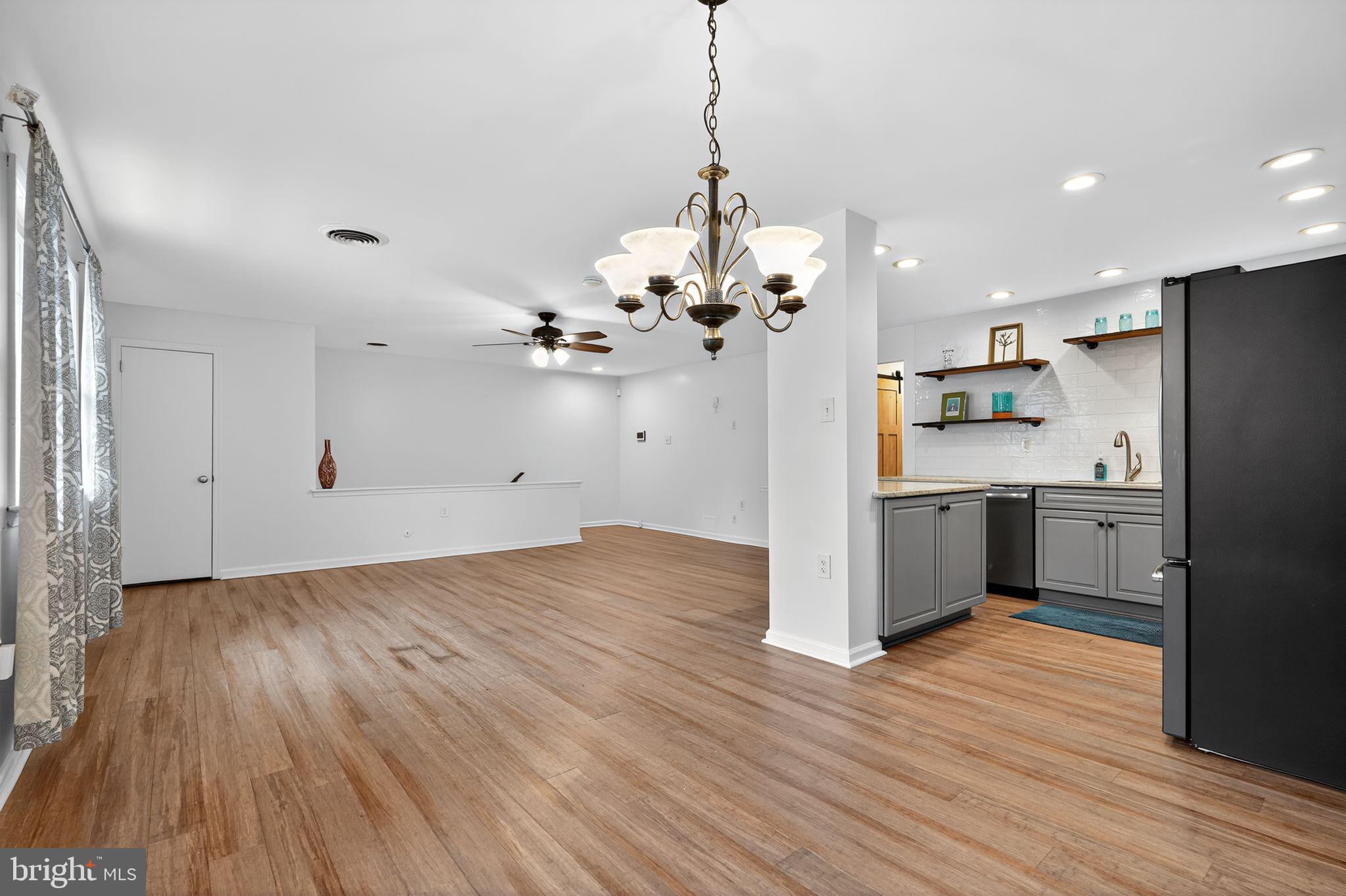 908 Yardley Commons Yardley, PA 19067 - Photo 2 of 28 a view of a kitchen with wooden floor
