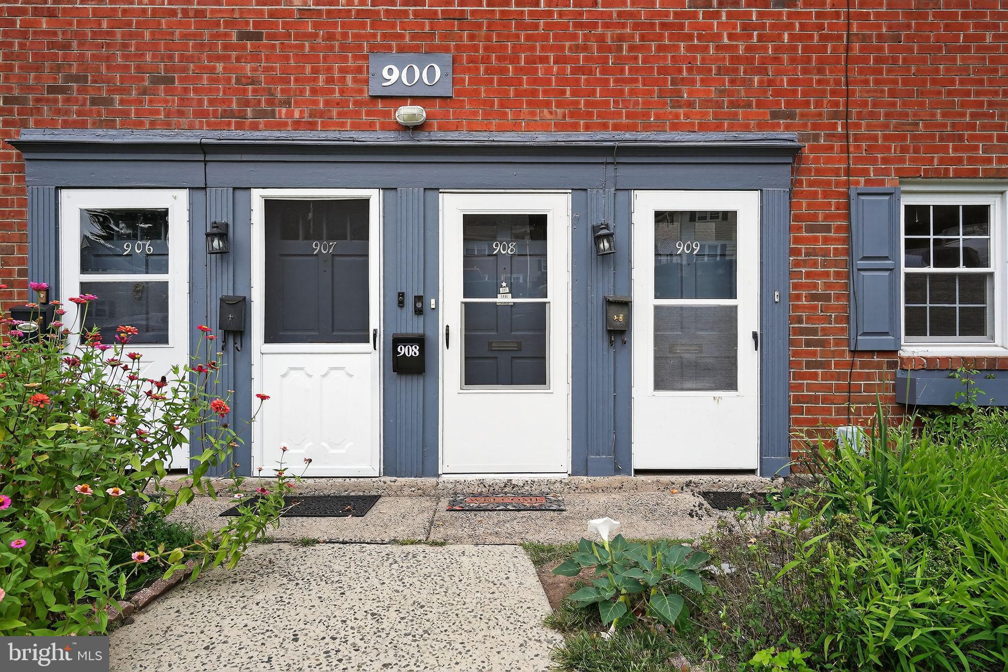 908 Yardley Commons Yardley, PA 19067 - Photo 21 of 28 a front view of a house with a yard