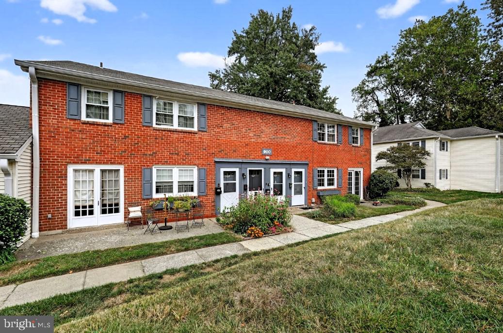 908 Yardley Commons Yardley, PA 19067 - Photo 22 of 28 a front view of a house with a yard