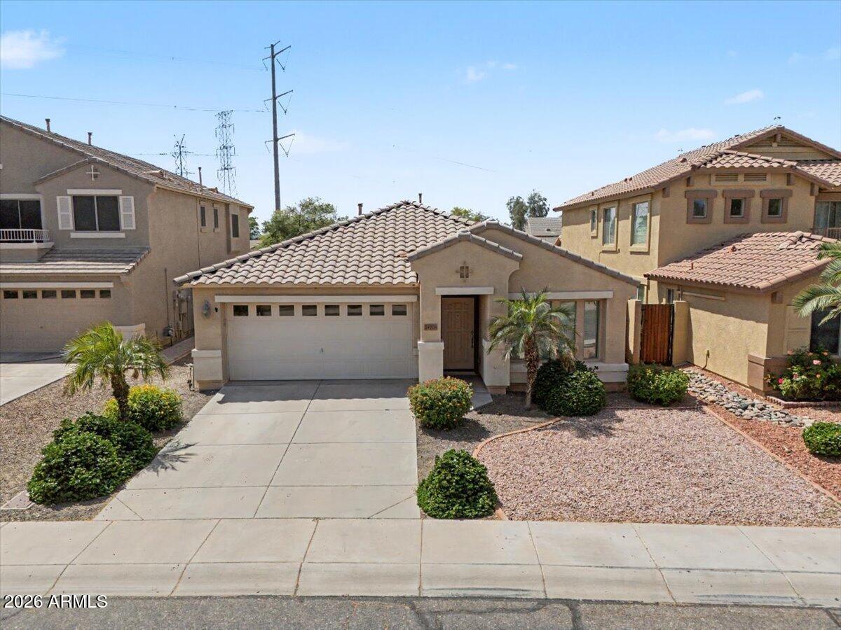 24726 North 29th Place Phoenix, AZ 85024 - Photo 1 of 31 a front view of a house with garden