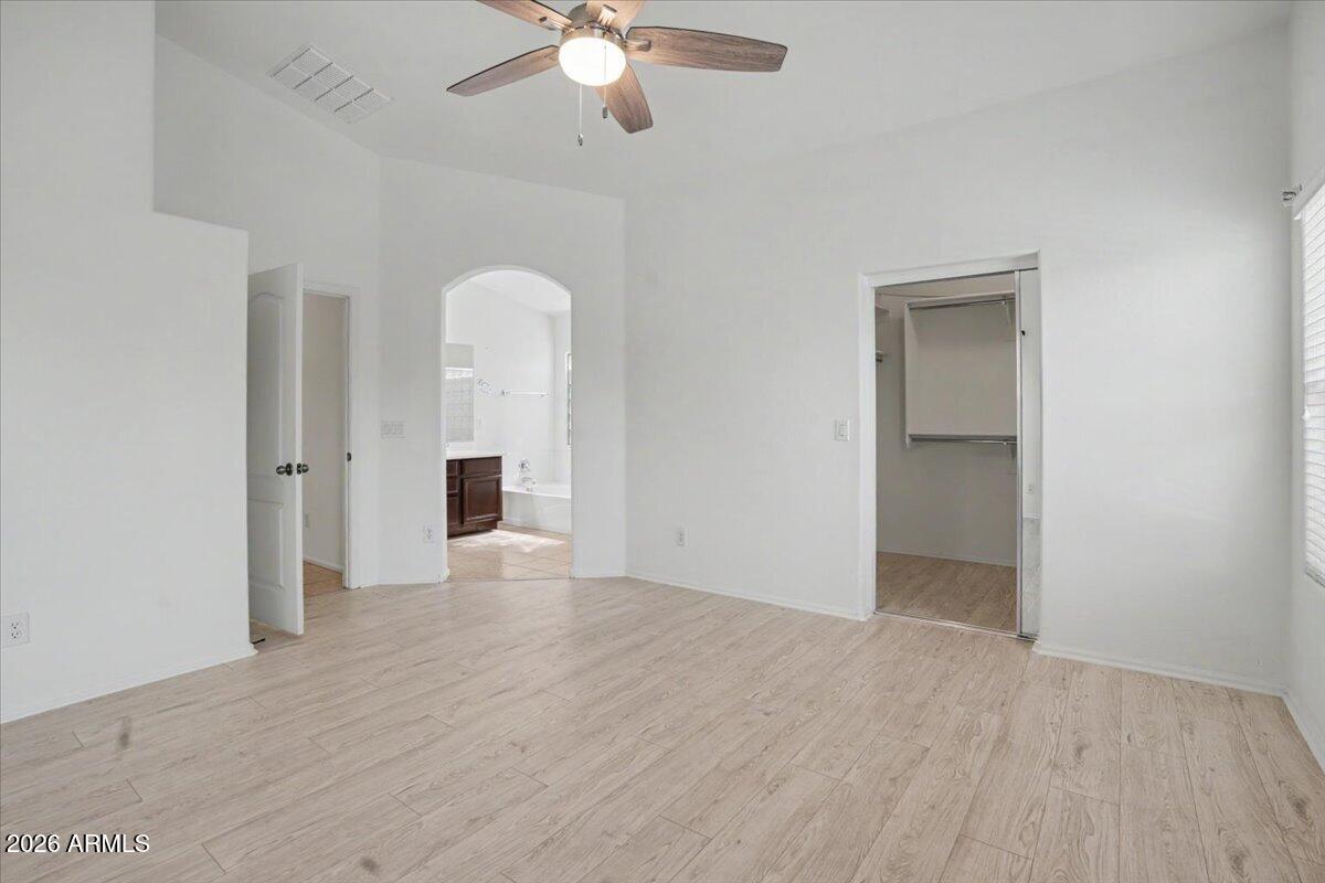 24726 North 29th Place Phoenix, AZ 85024 - Photo 15 of 31 wooden floor in an empty room with a window