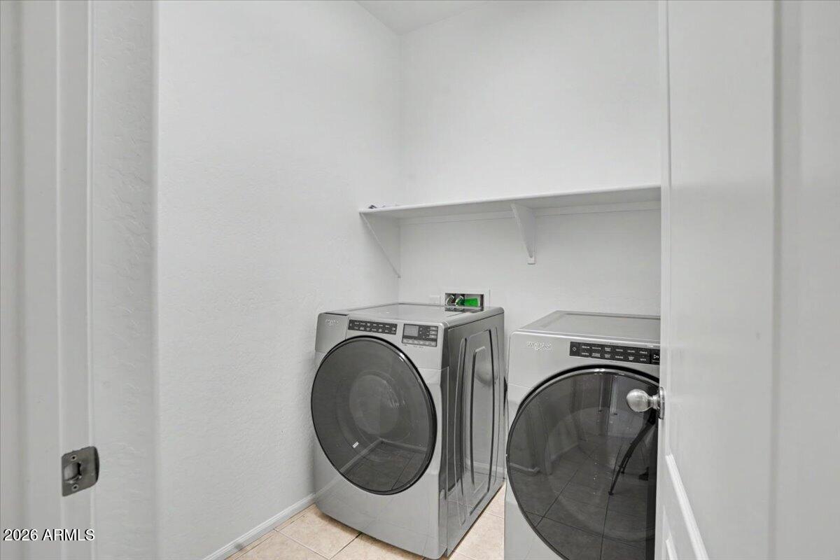24726 North 29th Place Phoenix, AZ 85024 - Photo 23 of 31 a utility room with dryer and washer