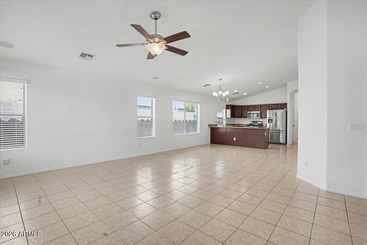 24726 North 29th Place Phoenix, AZ 85024 - Photo 4 of 31 a view of a livingroom with furniture and an empty room