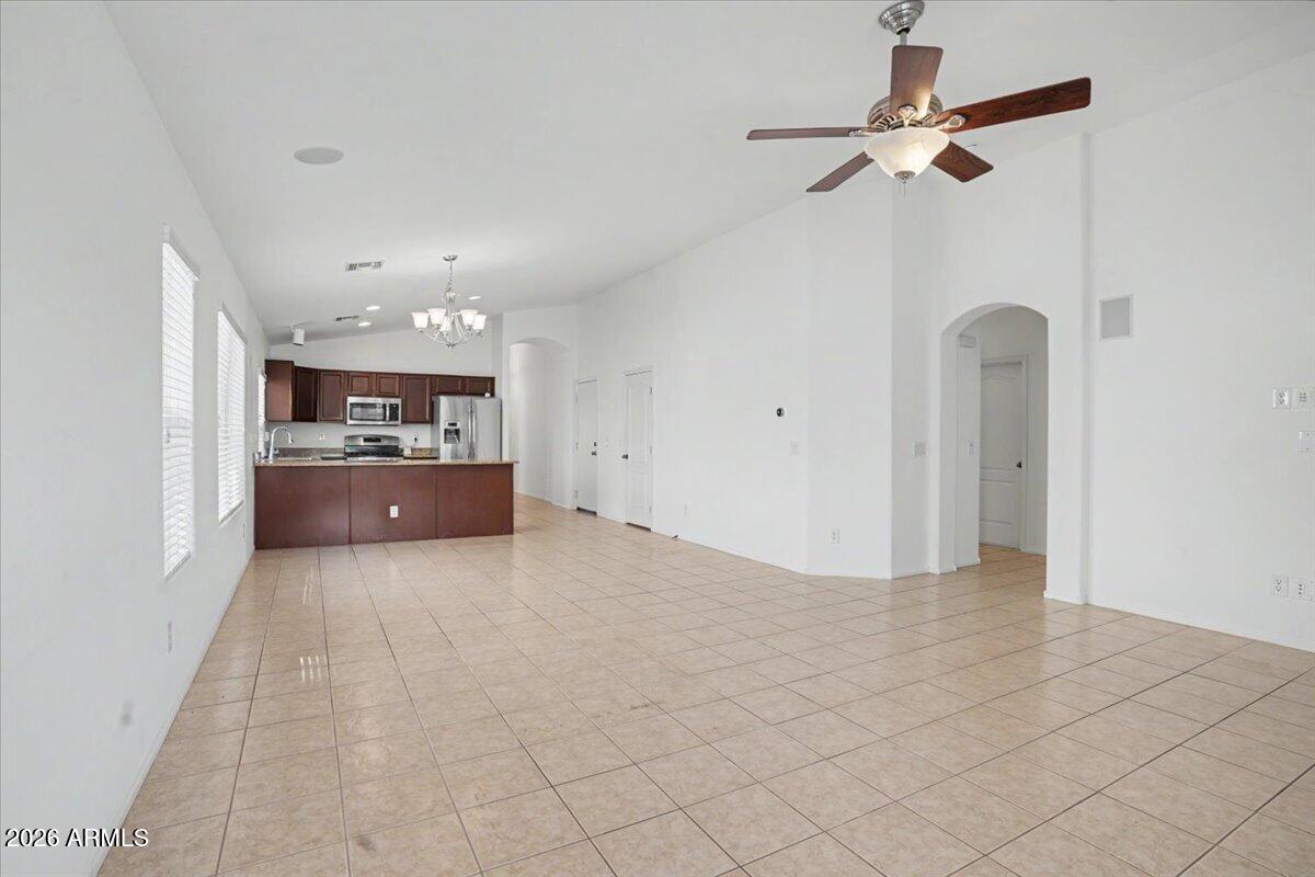 24726 North 29th Place Phoenix, AZ 85024 - Photo 5 of 31 a view of a livingroom with furniture and a ceiling fan