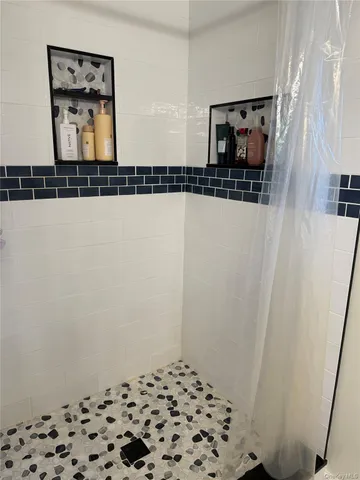 a bathroom with a sink a mirror and vanity