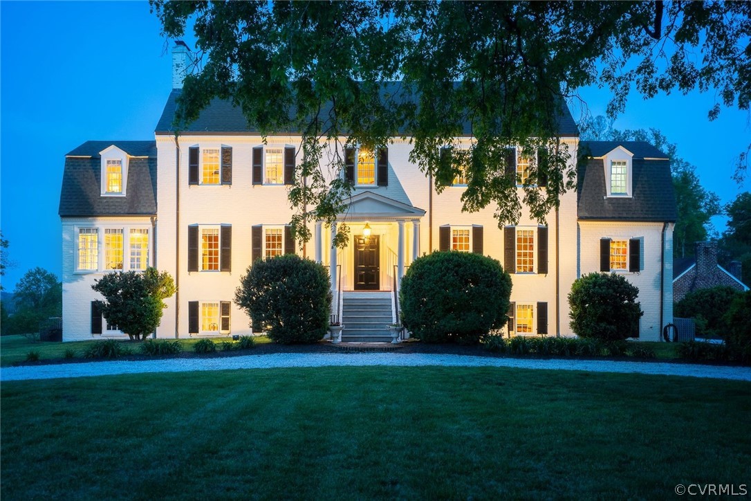 front view of a house with a yard