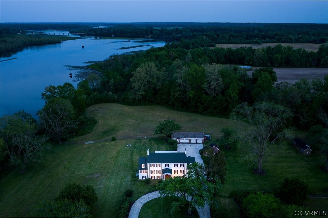 1273 North Point Farm Road King William, VA 23086 - Photo 2 of 47 a view of a lake with a yard