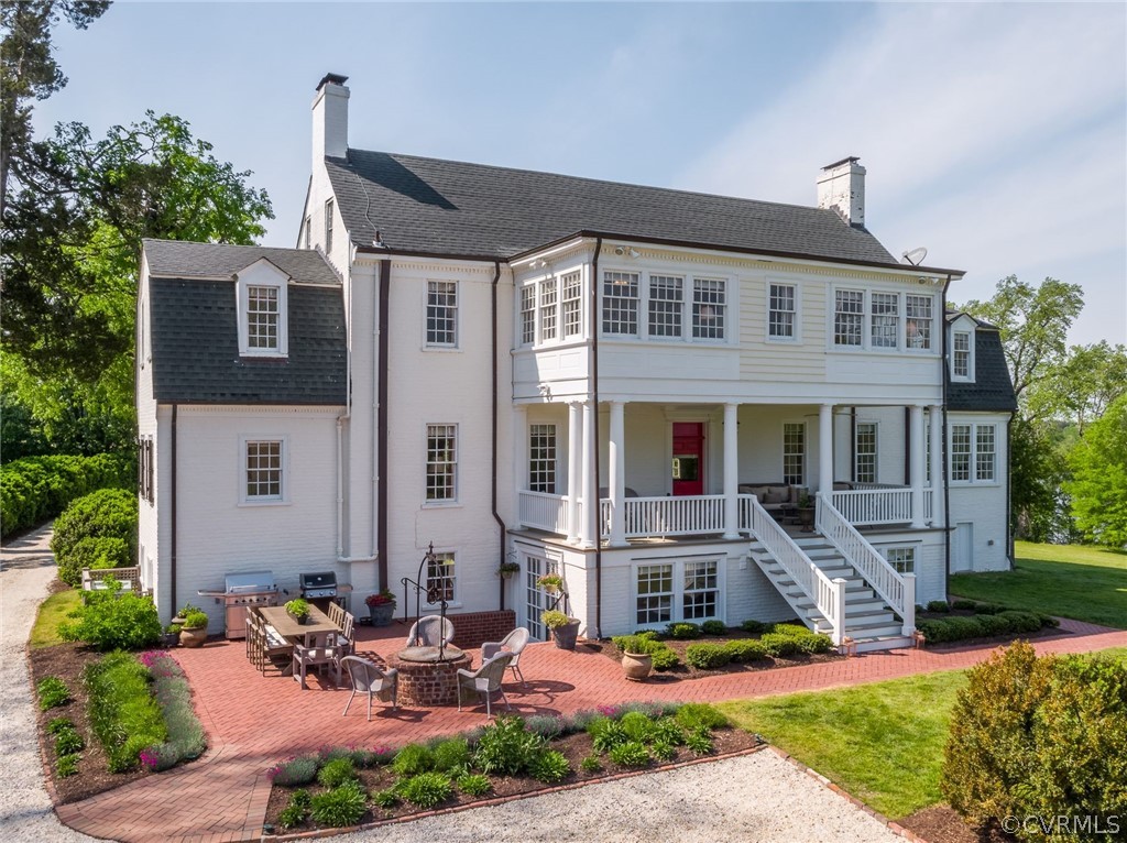 1273 North Point Farm Road King William, VA 23086 - Photo 5 of 47 a front view of a house with garden