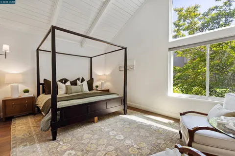 a view of room with furniture and windows