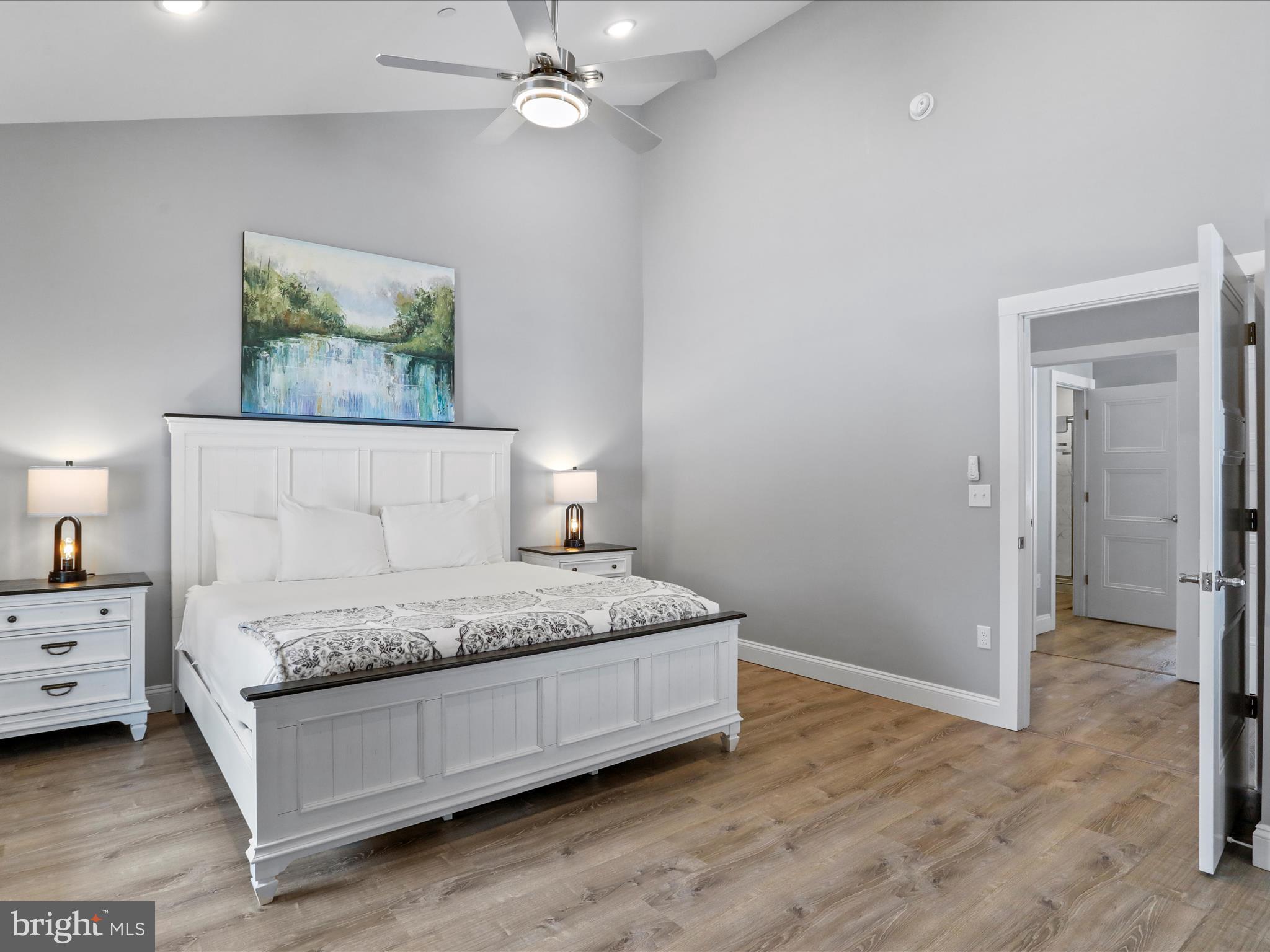 215 Fair Gate Road McHenry, MD 21541 - Photo 15 of 52 a bedroom with a bed and a chandelier