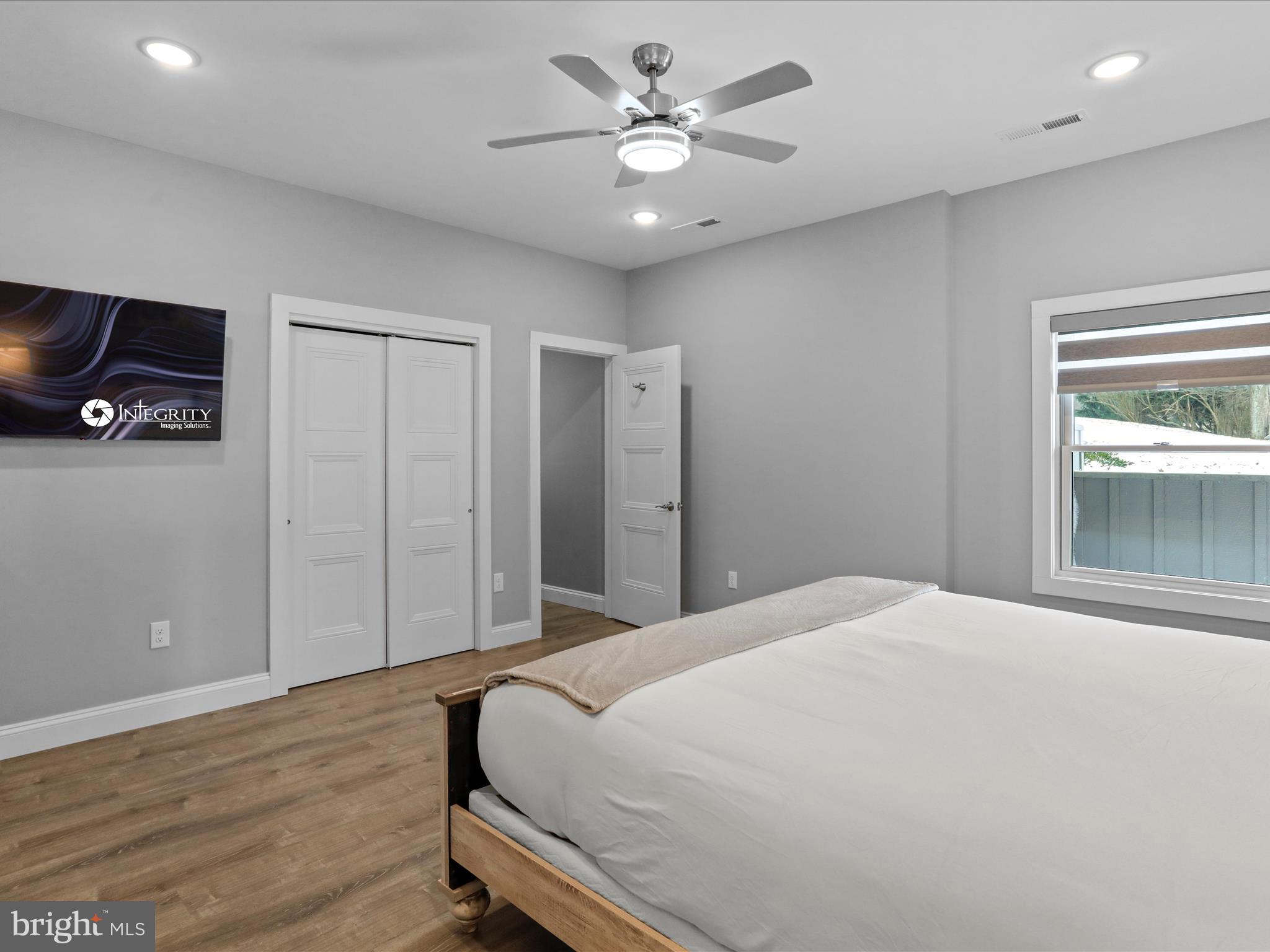 215 Fair Gate Road McHenry, MD 21541 - Photo 28 of 52 a bedroom with a bed and a window