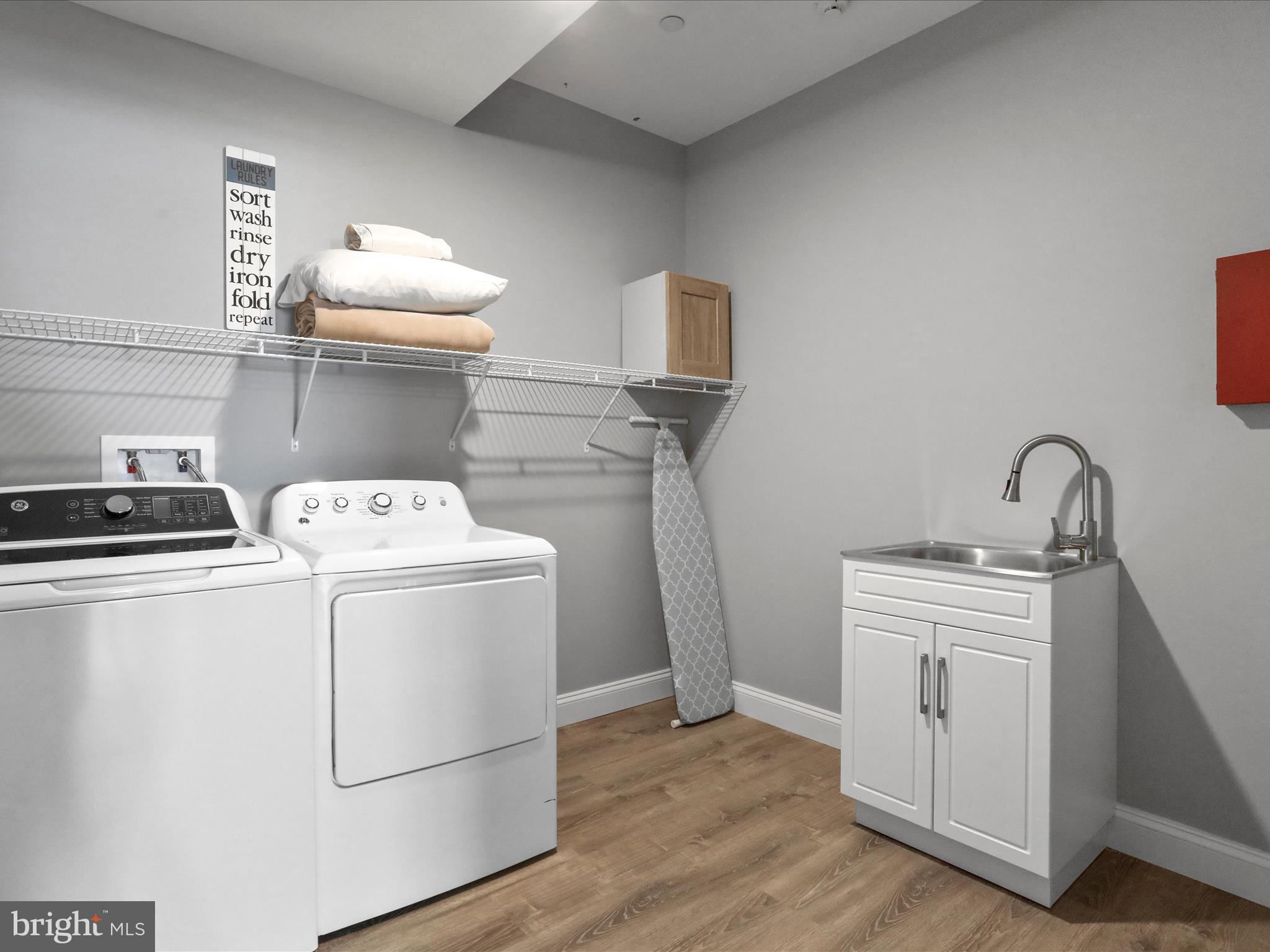 215 Fair Gate Road McHenry, MD 21541 - Photo 32 of 52 a utility room with dryer and washer