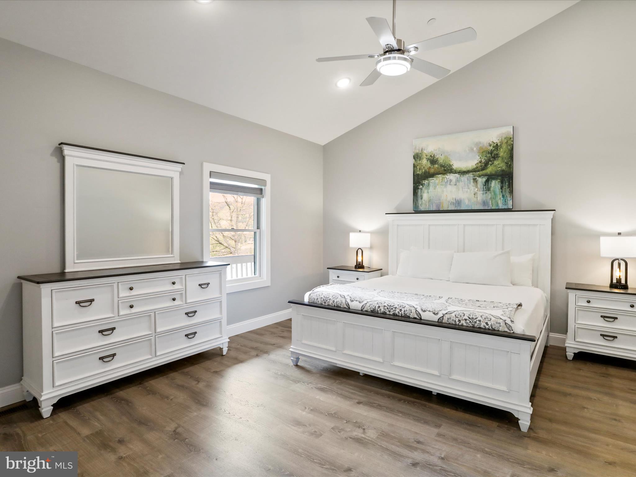 215 Fair Gate Road McHenry, MD 21541 - Photo 33 of 52 a bedroom with a bed and a dresser