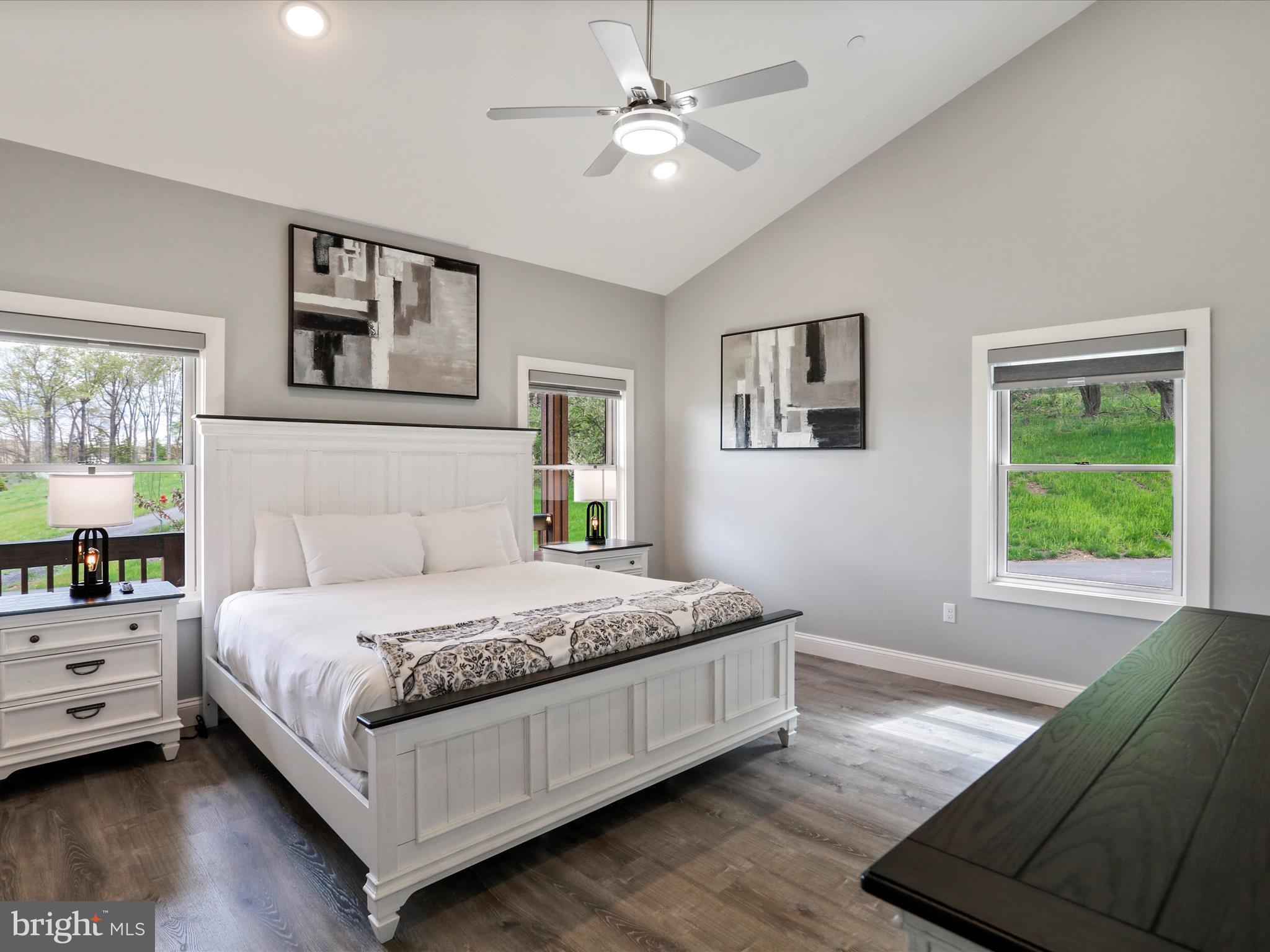 215 Fair Gate Road McHenry, MD 21541 - Photo 38 of 52 a bedroom with a bed chandelier and a window