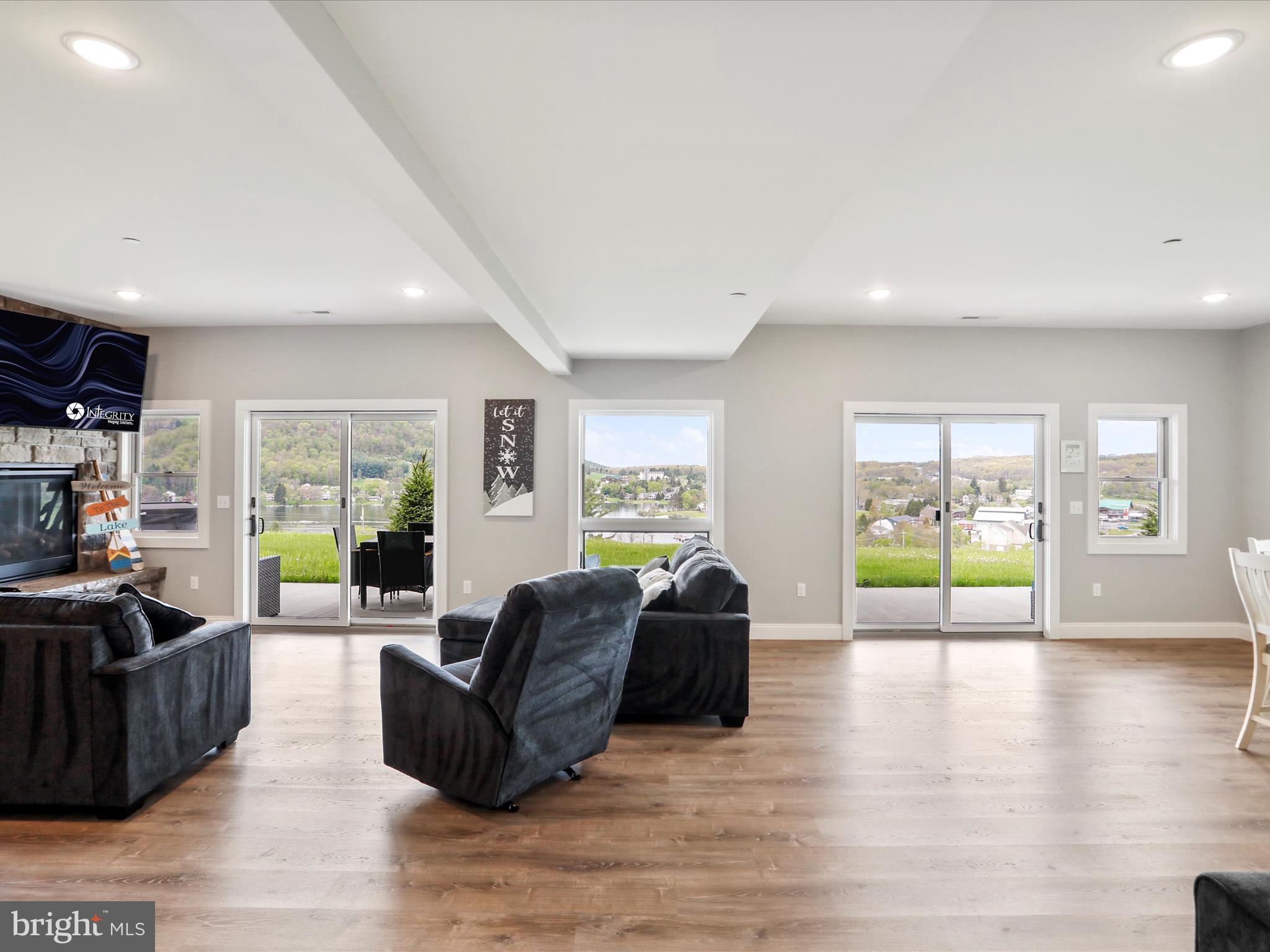 215 Fair Gate Road McHenry, MD 21541 - Photo 43 of 52 a living room with furniture window and wooden floor