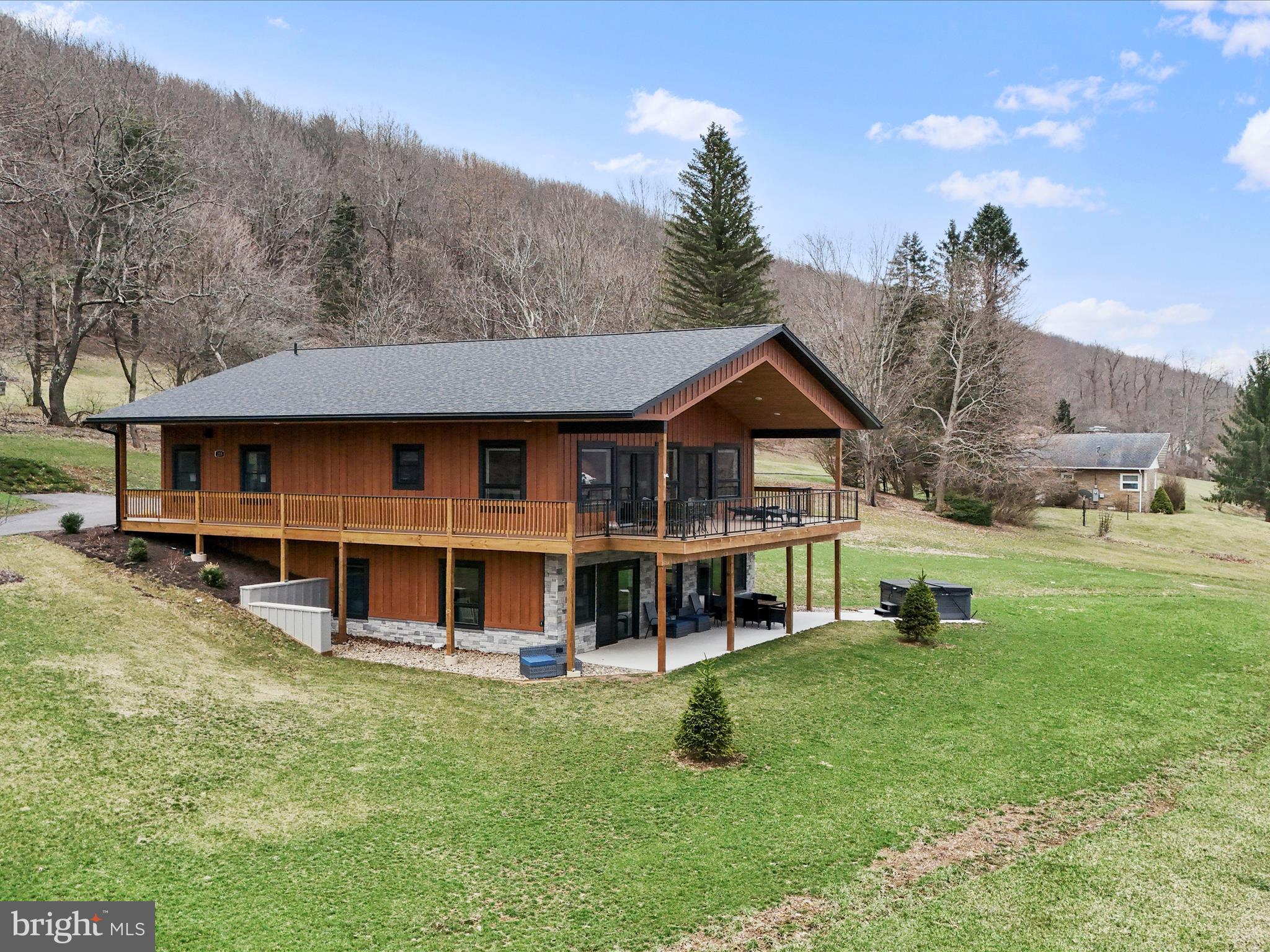 215 Fair Gate Road McHenry, MD 21541 - Photo 47 of 52 a view of house with yard and entertaining space