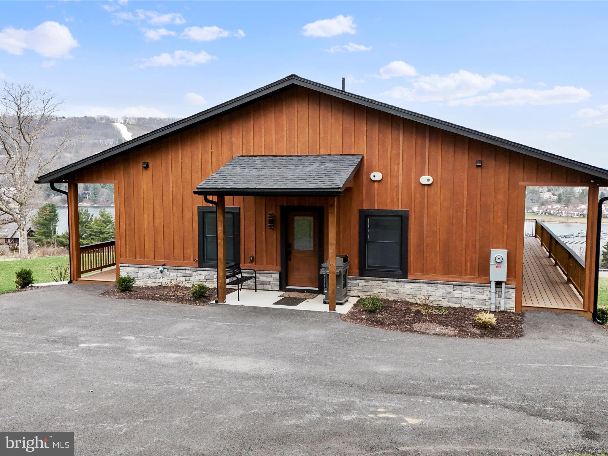 215 Fair Gate Road McHenry, MD 21541 - Photo 52 of 52 a view of a house with backyard and porch