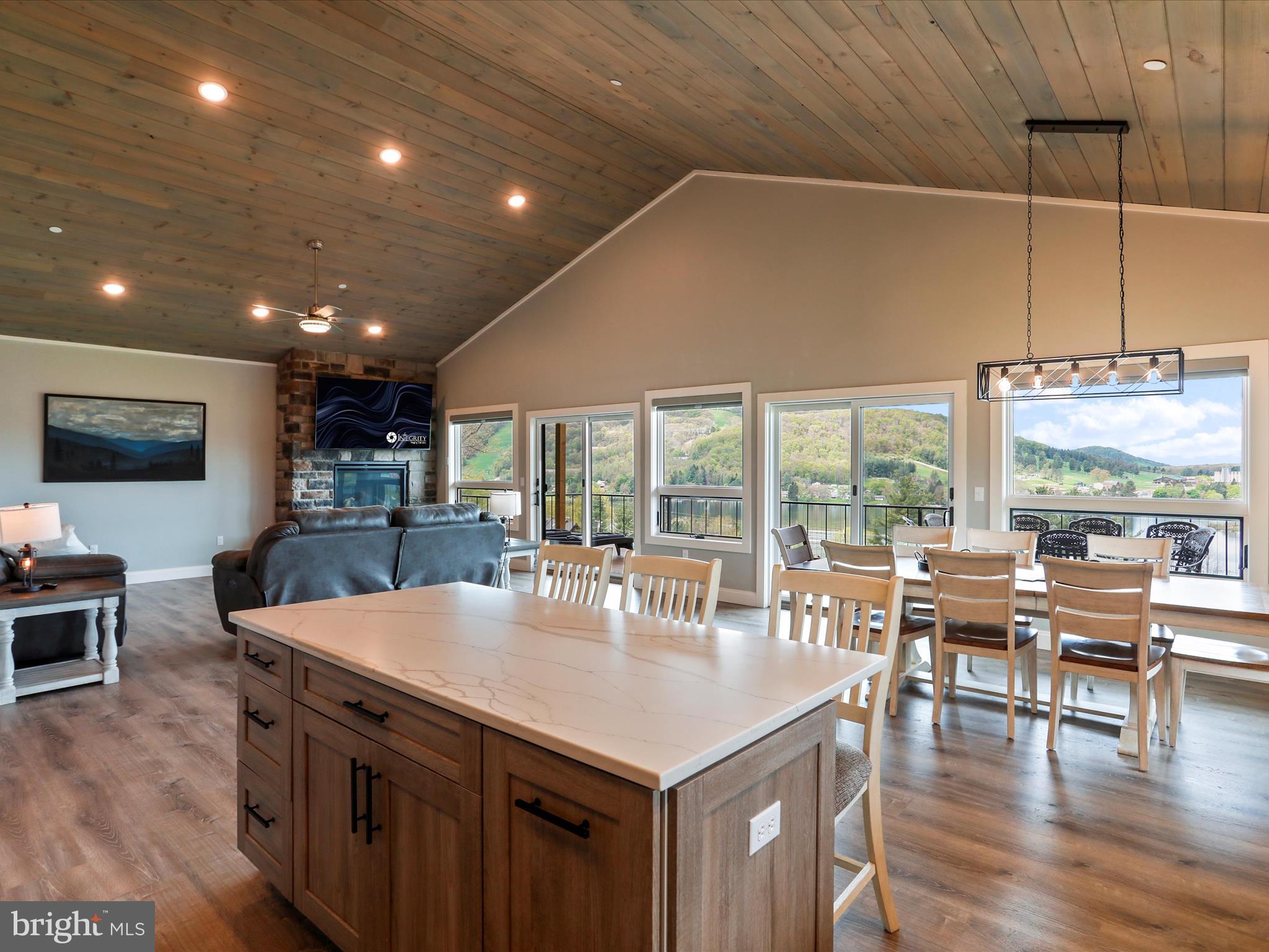 215 Fair Gate Road McHenry, MD 21541 - Photo 6 of 52 a large kitchen with kitchen island a large window in it