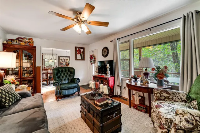 a bedroom with a bed and a table in it