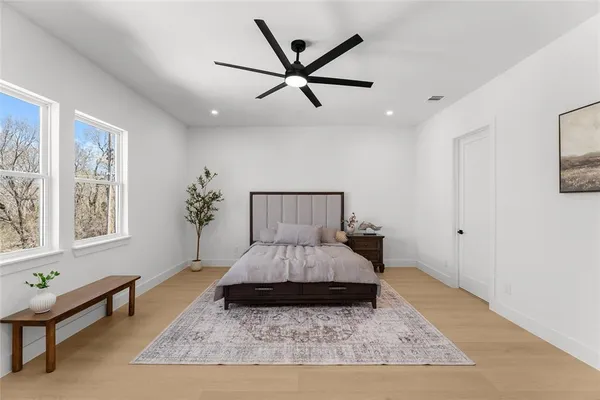 a living room with furniture rug and window