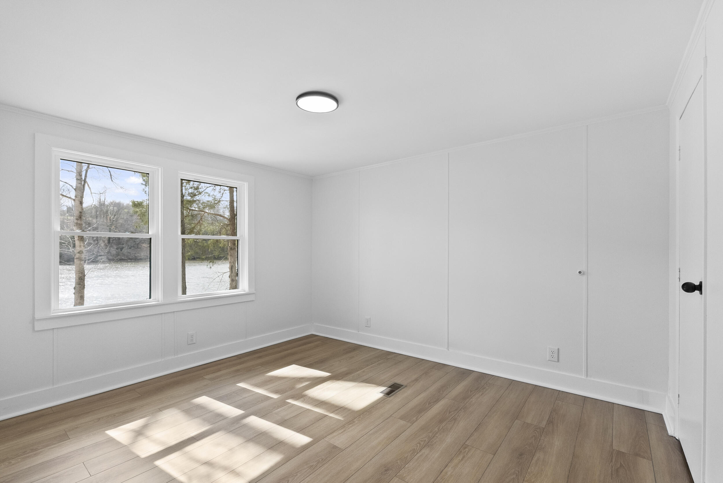 509 Pleasure Point Drive Goodview, VA 24095 - Photo 16 of 38 an empty room with a window