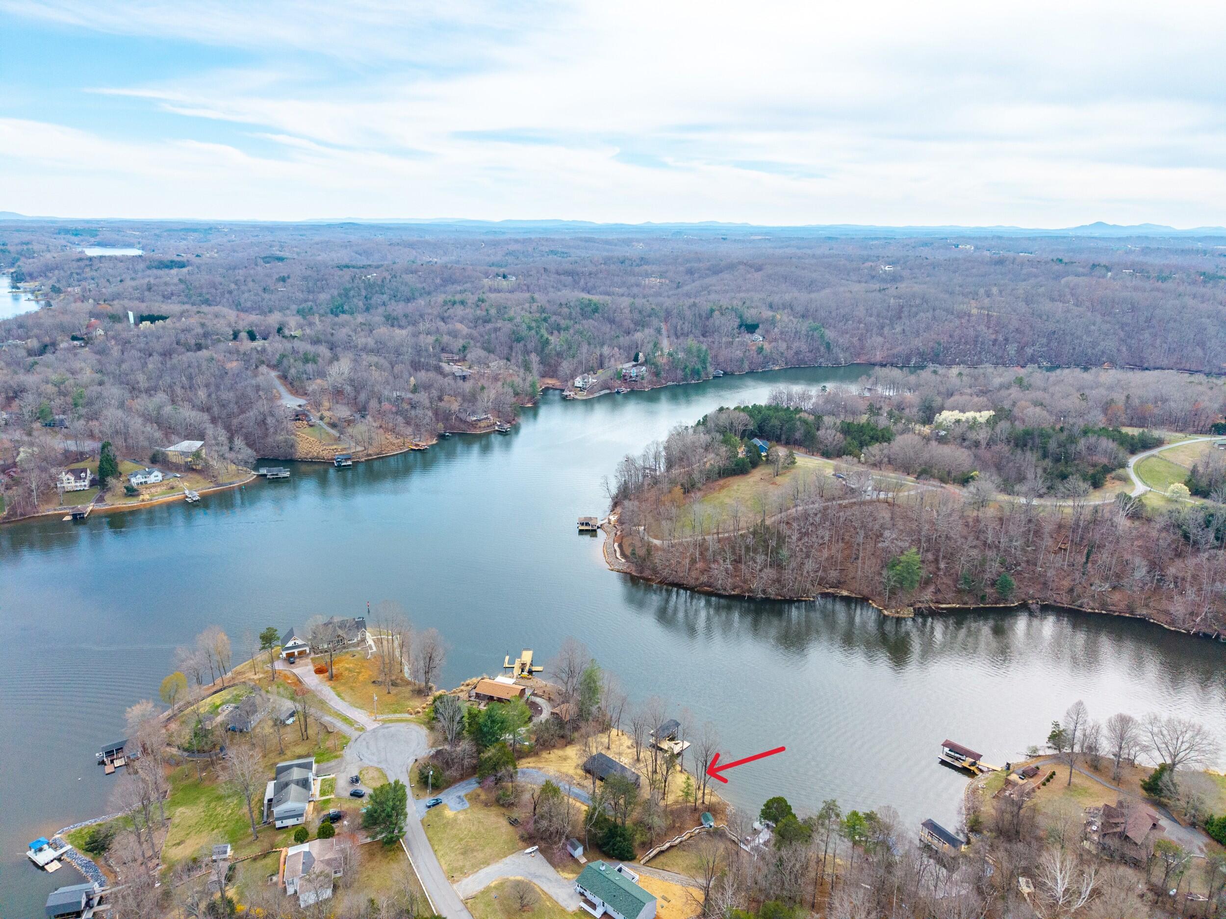 509 Pleasure Point Drive Goodview, VA 24095 - Photo 32 of 38 an aerial view of a house with a lake view