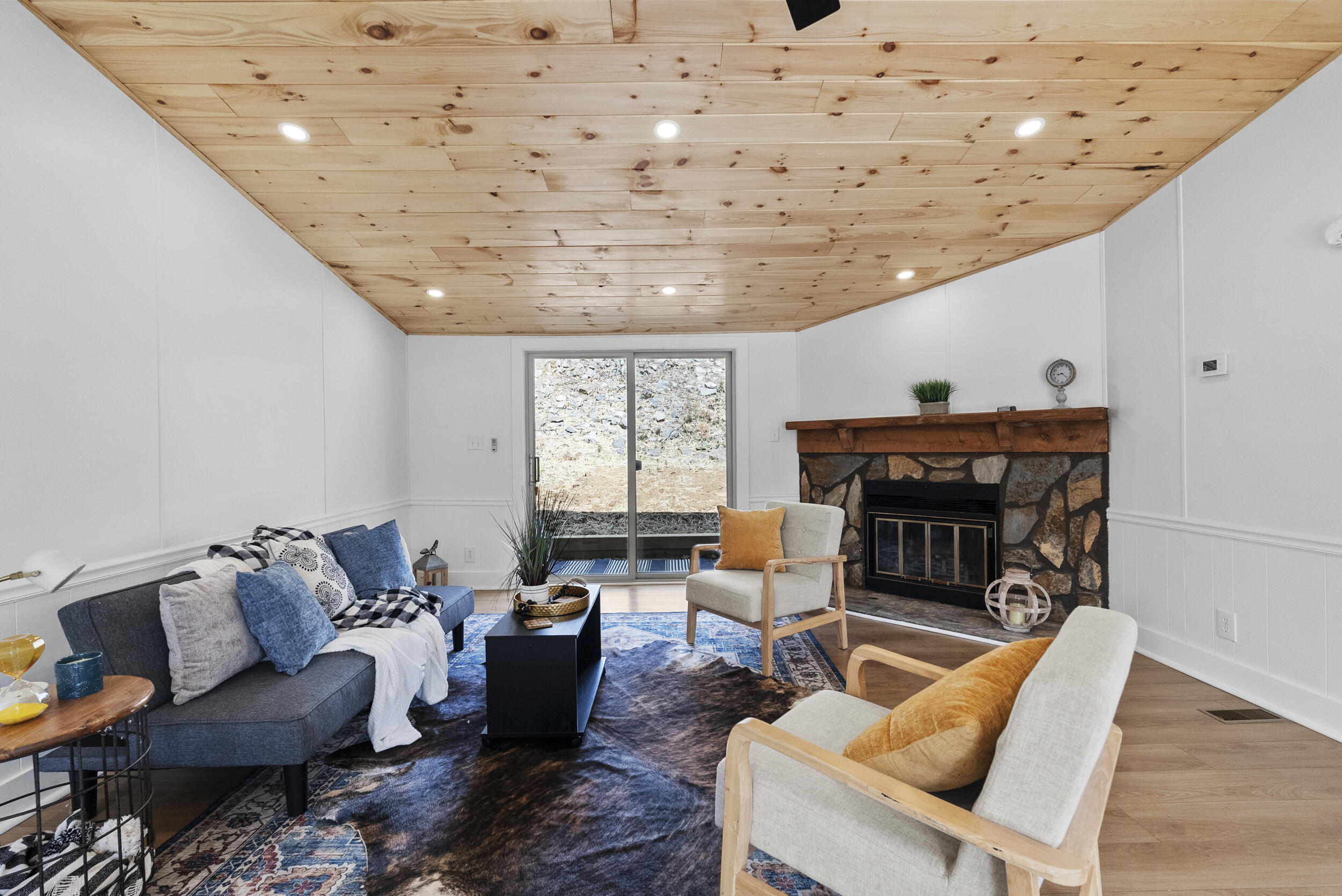 509 Pleasure Point Drive Goodview, VA 24095 - Photo 5 of 38 a living room with furniture and a fireplace