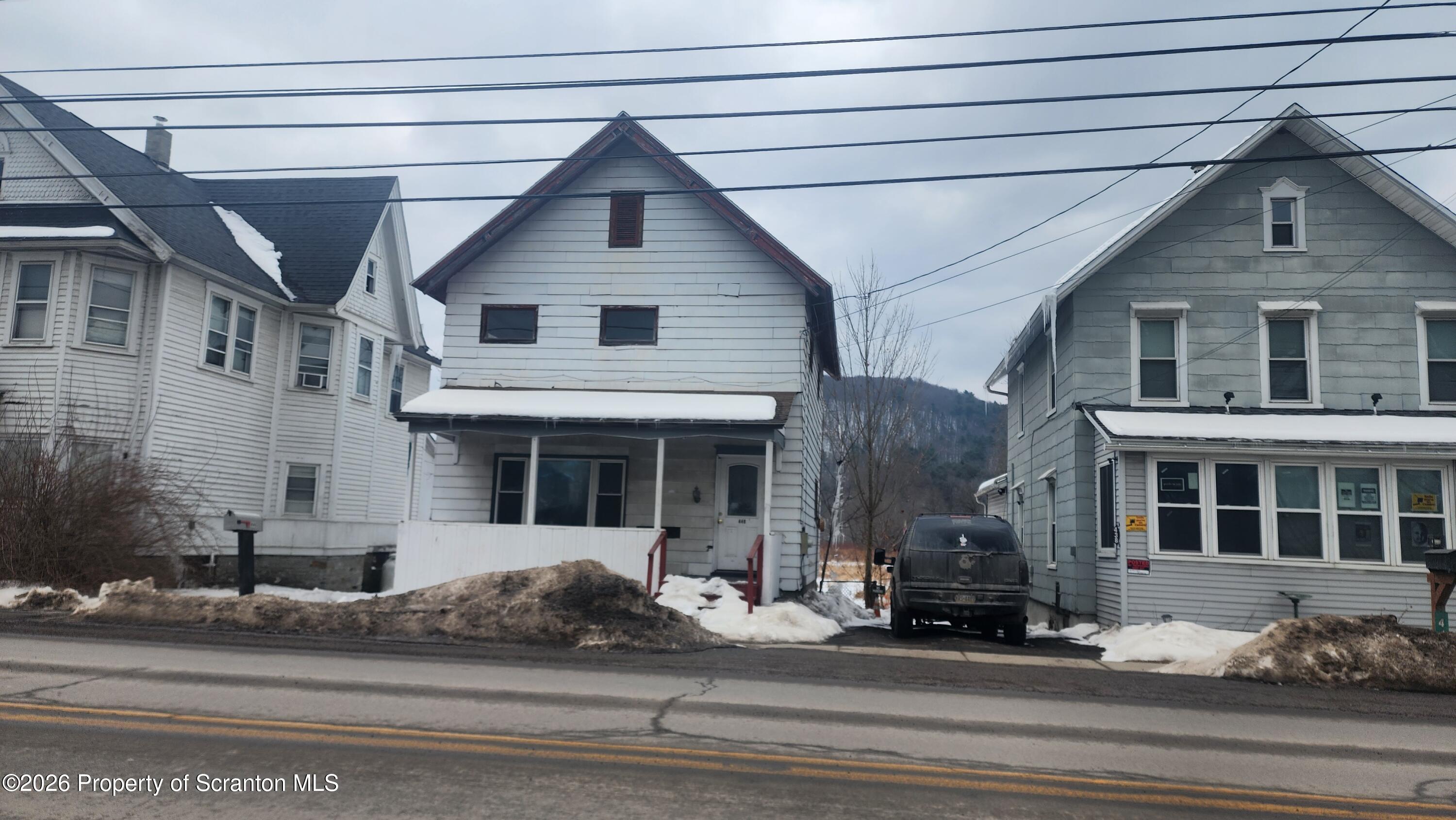 446 Main Street Hallstead, PA 18822 - Photo 1 of 51 a front view of a house with a yard