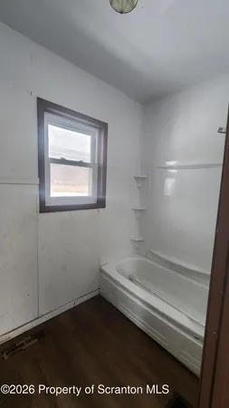 a bathroom with a bathtub