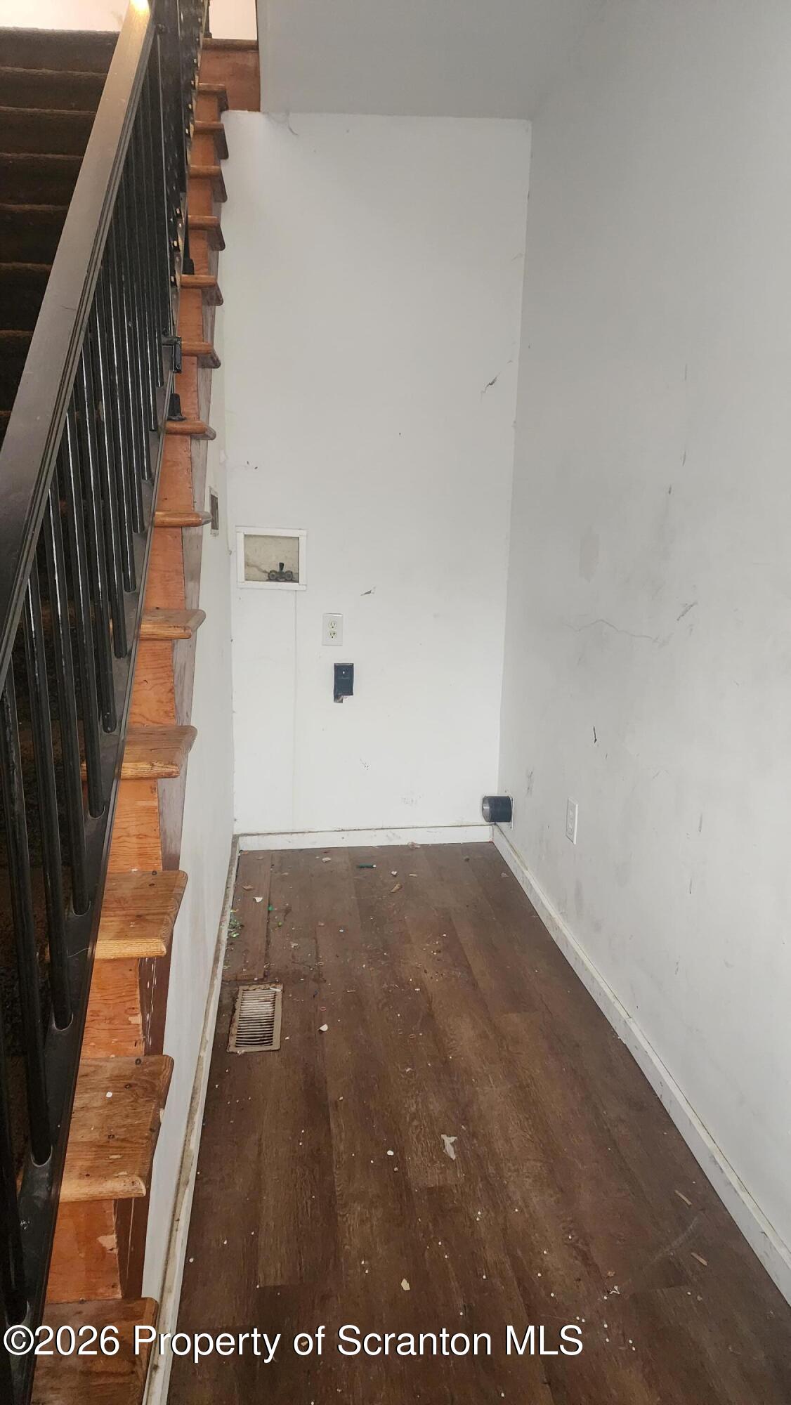 446 Main Street Hallstead, PA 18822 - Photo 2 of 51 a view of an empty room with stairs