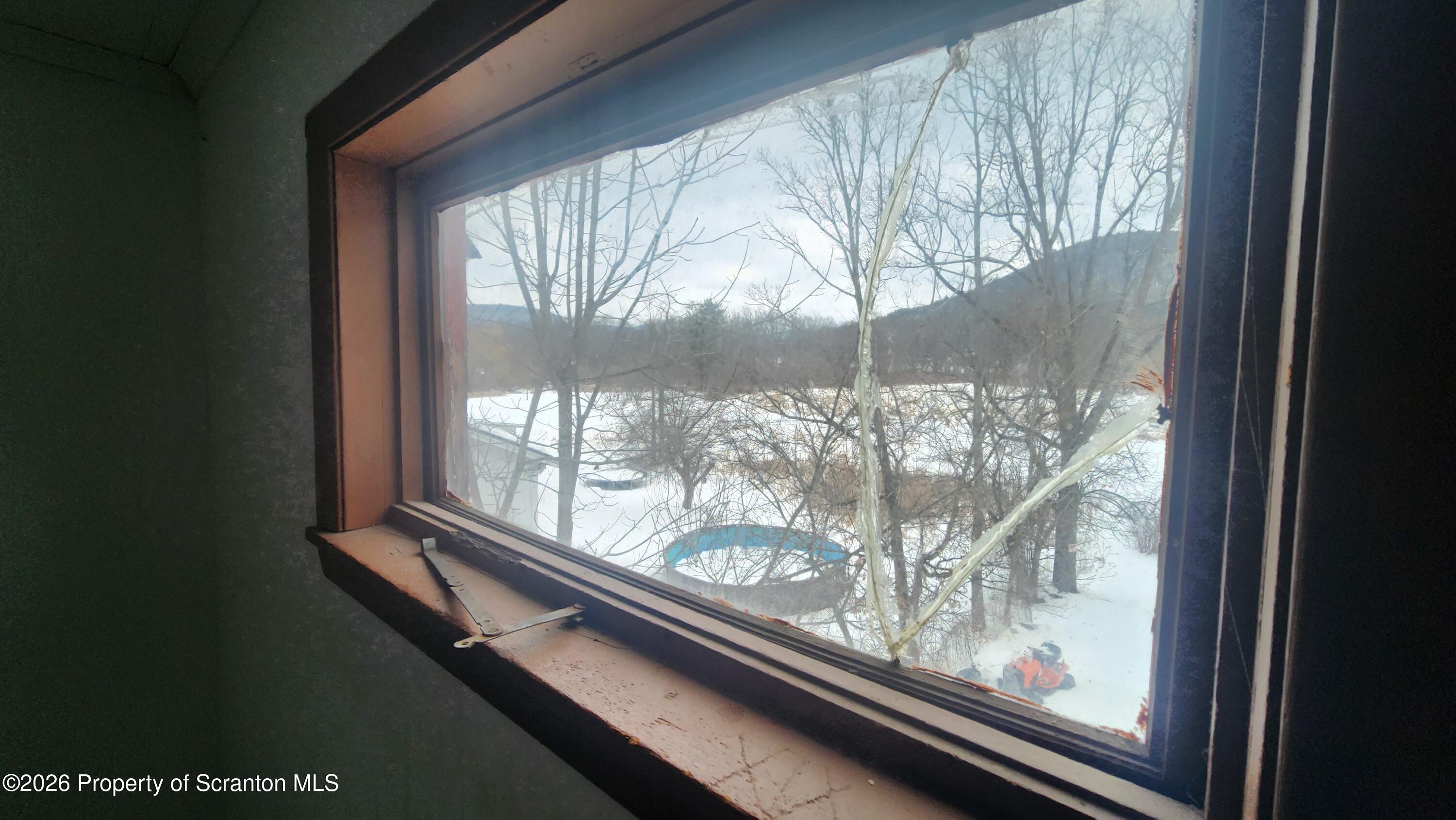 446 Main Street Hallstead, PA 18822 - Photo 24 of 51 a view of a room with wooden floor and front door