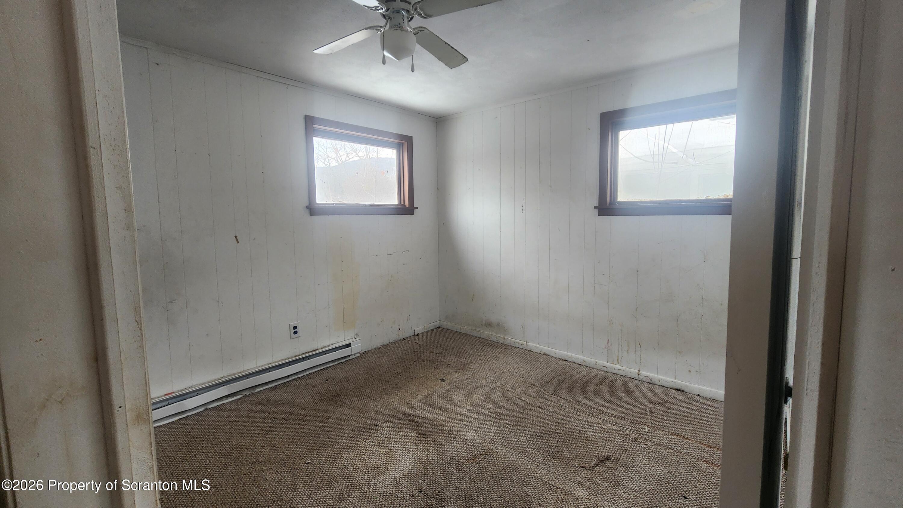 446 Main Street Hallstead, PA 18822 - Photo 27 of 51 an empty room with a window