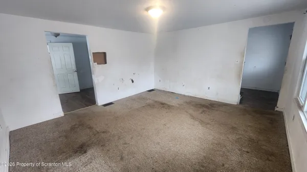 an empty room with an entrance