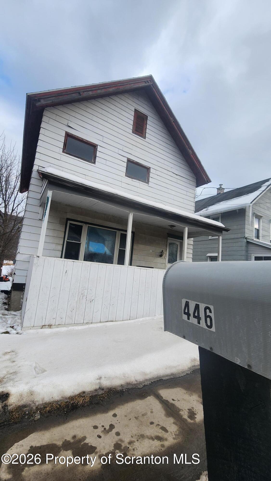 446 Main Street Hallstead, PA 18822 - Photo 51 of 51 a front view of a house with a garage