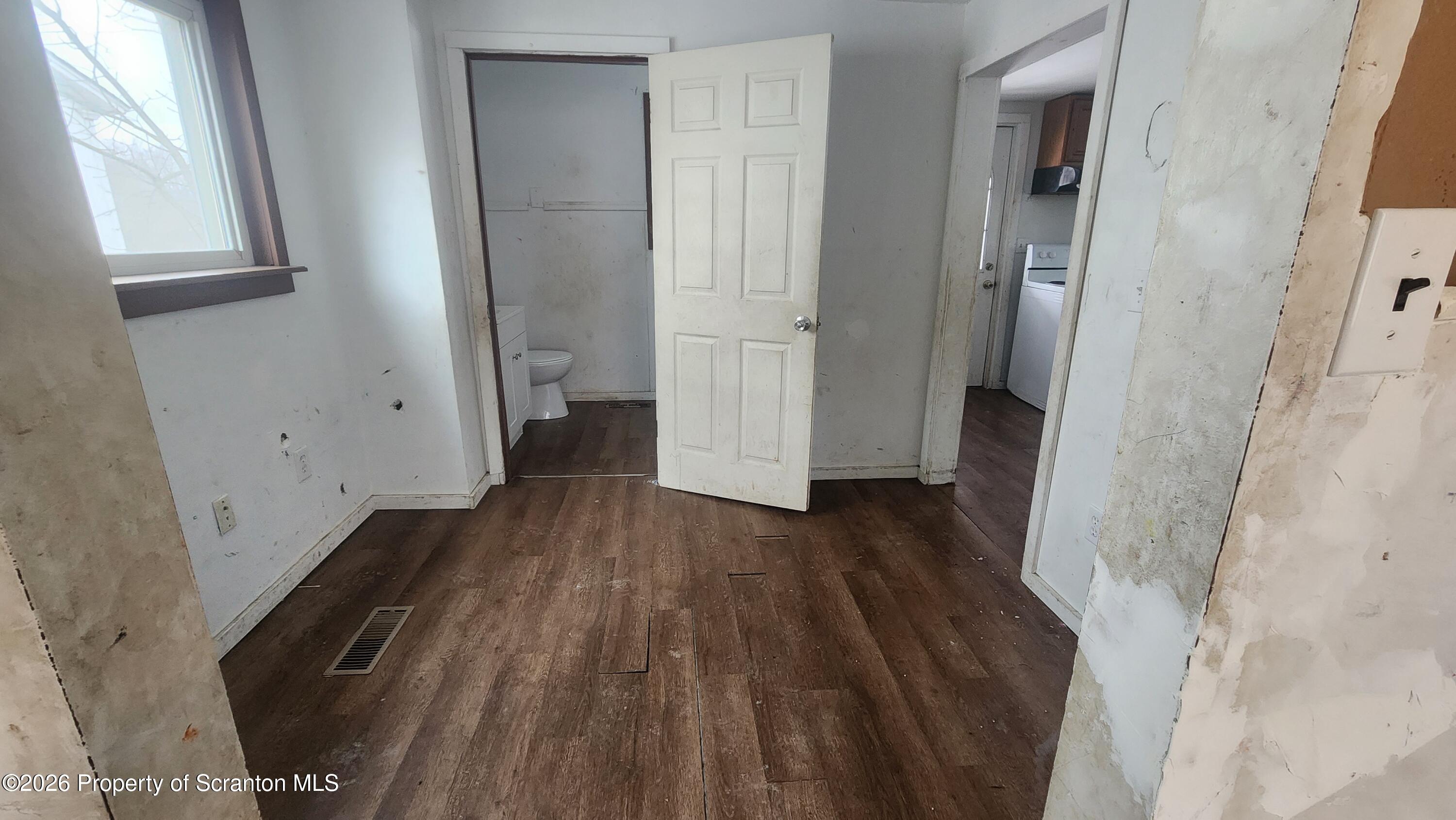 446 Main Street Hallstead, PA 18822 - Photo 8 of 51 a view of hallway with wooden floor