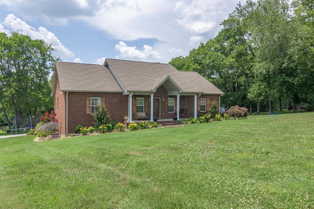 72 Vantrease Road Brush Creek, TN 38547 - Photo 1 of 25 Lovely all brick home with new custom shutters and beautiful landscaping