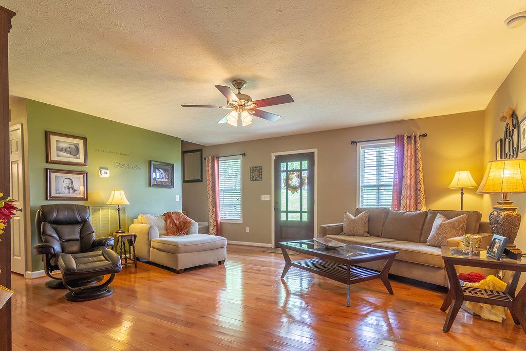 72 Vantrease Road Brush Creek, TN 38547 - Photo 12 of 25 Great room with hardwood floors