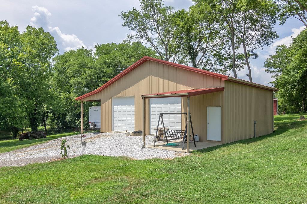 72 Vantrease Road Brush Creek, TN 38547 - Photo 21 of 25 30x40 work shop with 12' lead creates 30 x 50 storage area