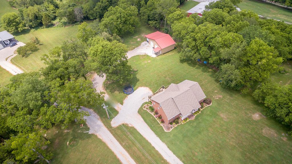 72 Vantrease Road Brush Creek, TN 38547 - Photo 6 of 25 cleared land beyond trees also goes with property