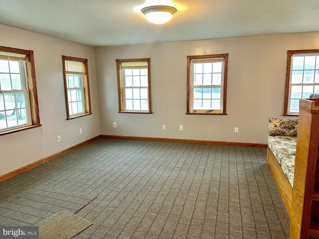 an empty room with windows