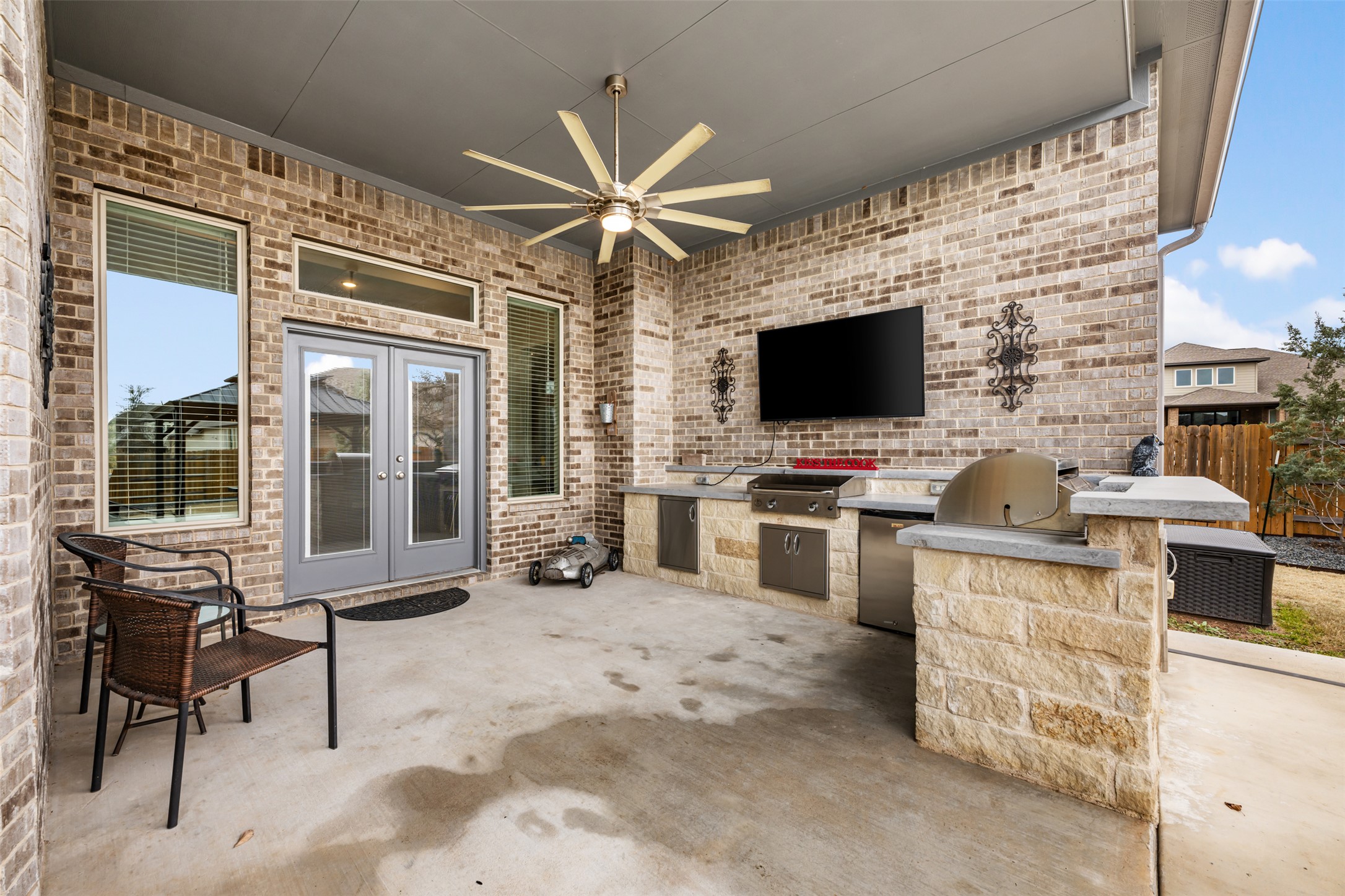 2501 Costera Street Leander, TX 78641 - Photo 27 of 40 A large ceiling fan to keep the chef cool.