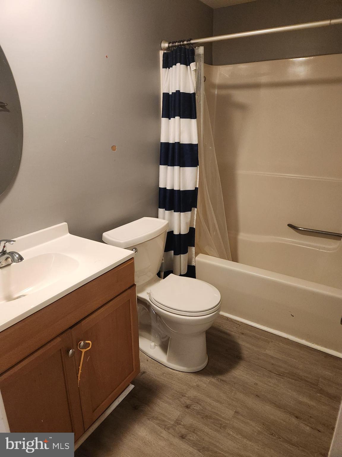 51 Ed Turner Lane, Unit 201 Harpers Ferry, WV 25425 - Photo 6 of 6 a bathroom with a toilet a sink and shower